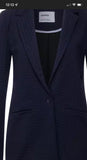 Blazer long pied de poule.              211732